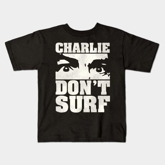 Charlie Don't Surf Kids T-Shirt by darklordpug